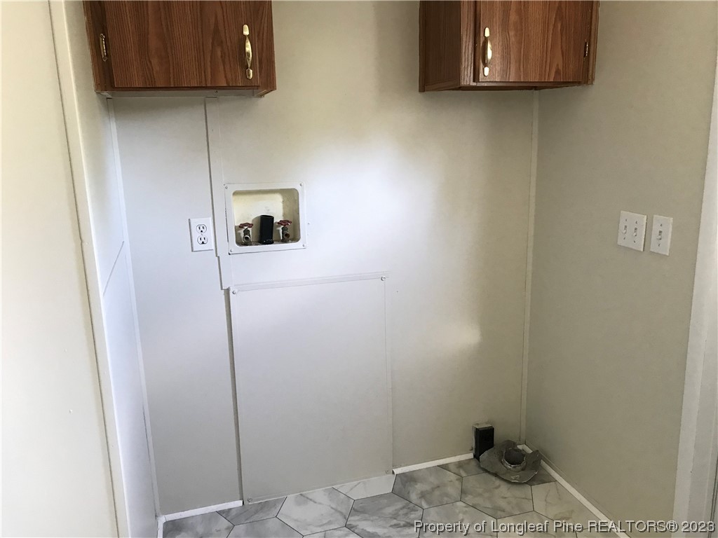 2046 Wade-Stedman Road Stedman, NC 28391 - Photo 14 of 17 a bathroom with a window