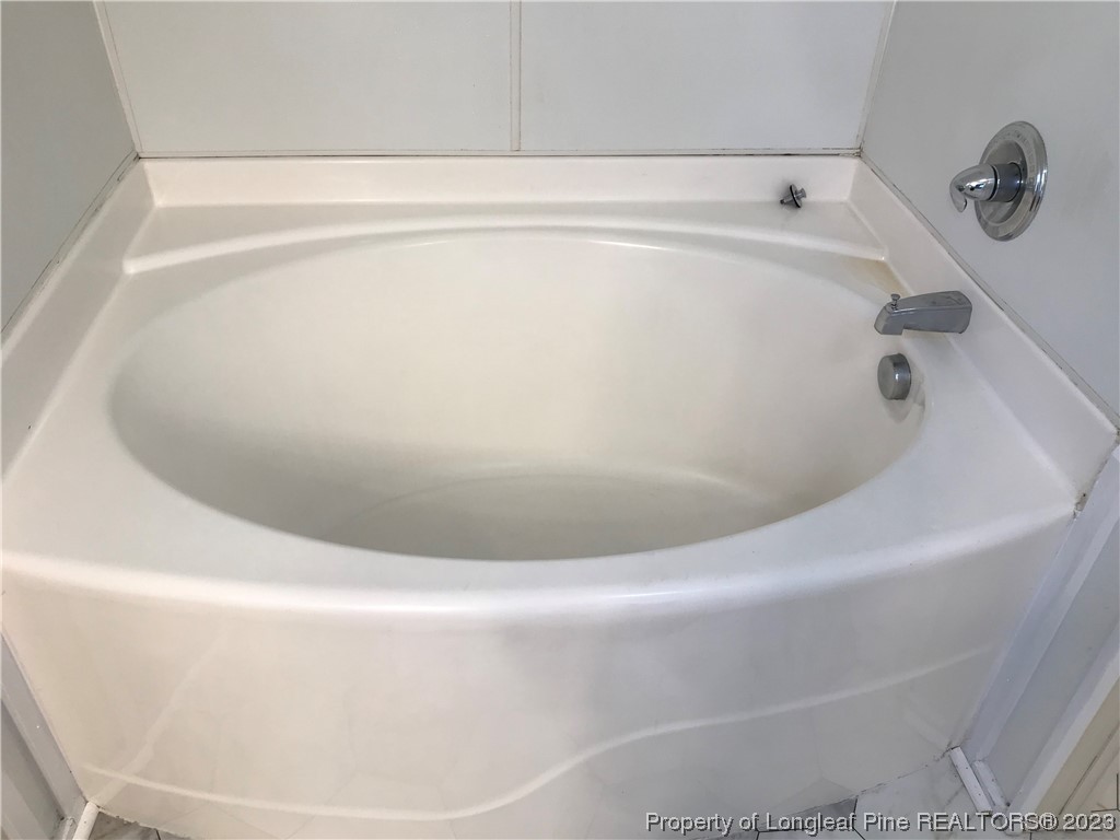 2046 Wade-Stedman Road Stedman, NC 28391 - Photo 6 of 17 a close up of a bathtub