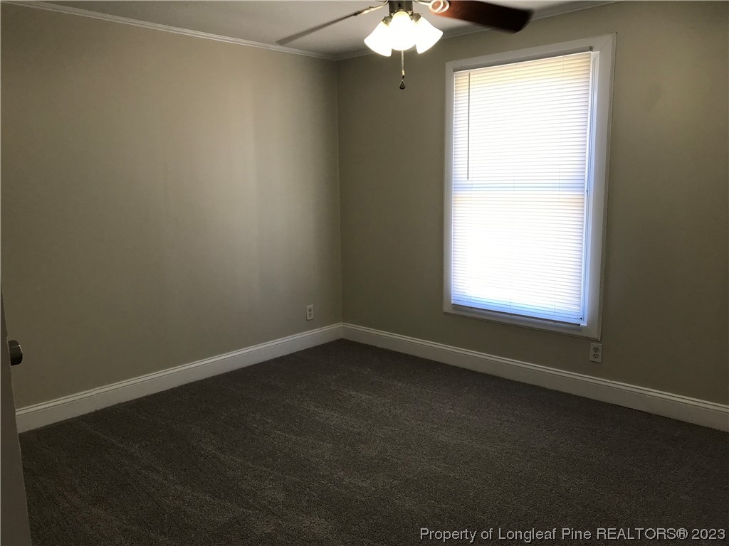 2046 Wade-Stedman Road Stedman, NC 28391 - Photo 7 of 17 an empty room with a window