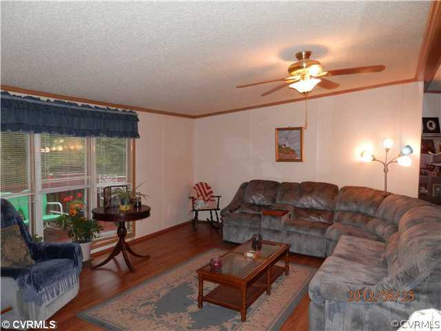 3415 Wickham Road Bumpass, VA 23024 - Photo 12 of 12 a living room with furniture