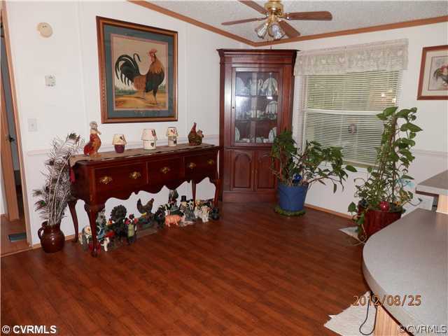 3415 Wickham Road Bumpass, VA 23024 - Photo 3 of 12 a living room with furniture and wooden floor