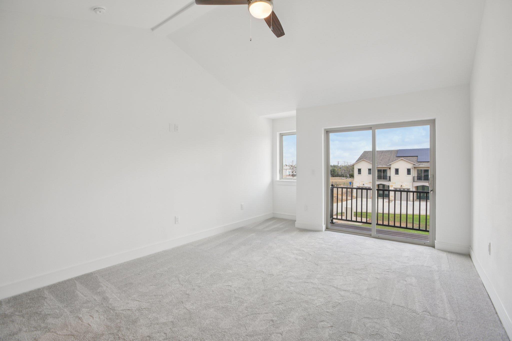 302 Tesla Circle Austin, TX 78681 - Photo 29 of 40 a view of a room with stairs and a couch