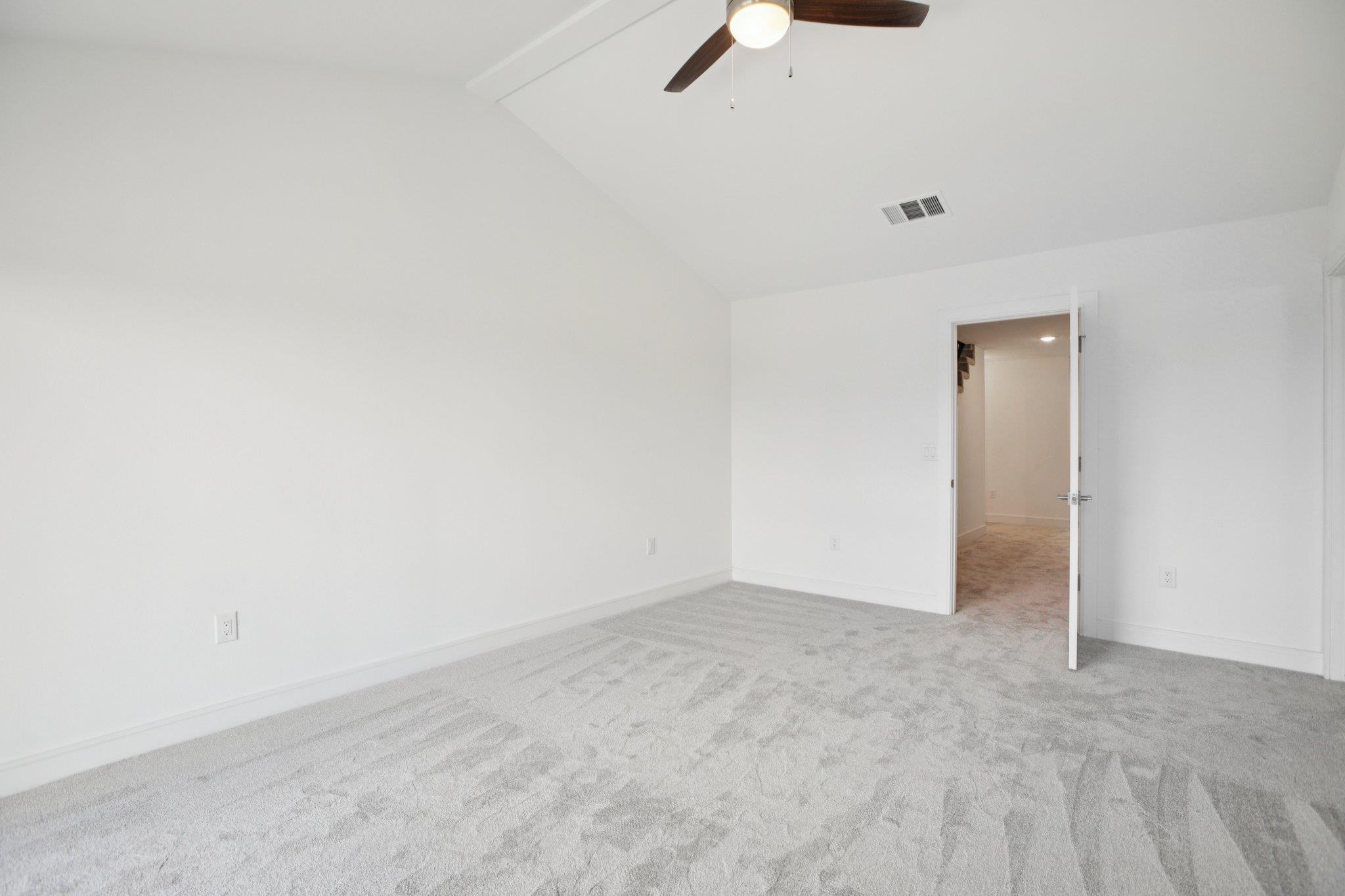 302 Tesla Circle Austin, TX 78681 - Photo 31 of 40 an empty room with natural light