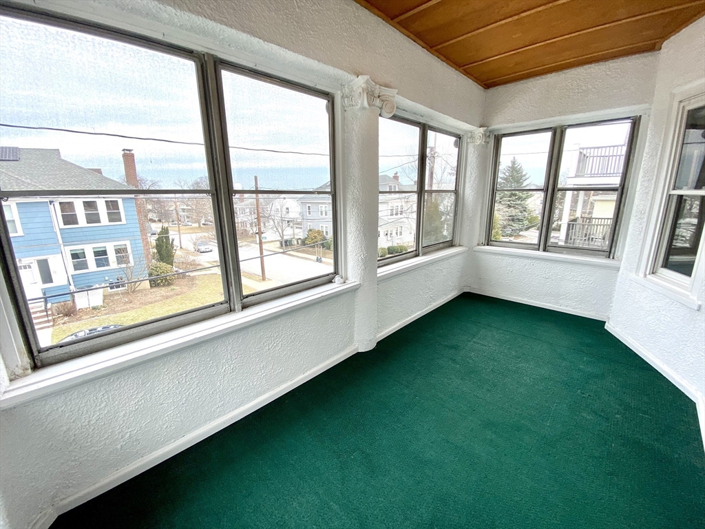 24 Clyde Road, Unit 3 Watertown, MA 02472 - Photo 12 of 13 a view of an empty room with a window