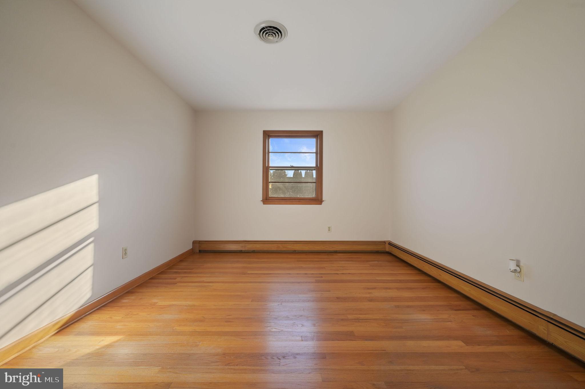 955 Twin Willows Road Smyrna, DE 19977 - Photo 24 of 27 a view of a room with window and wooden floor