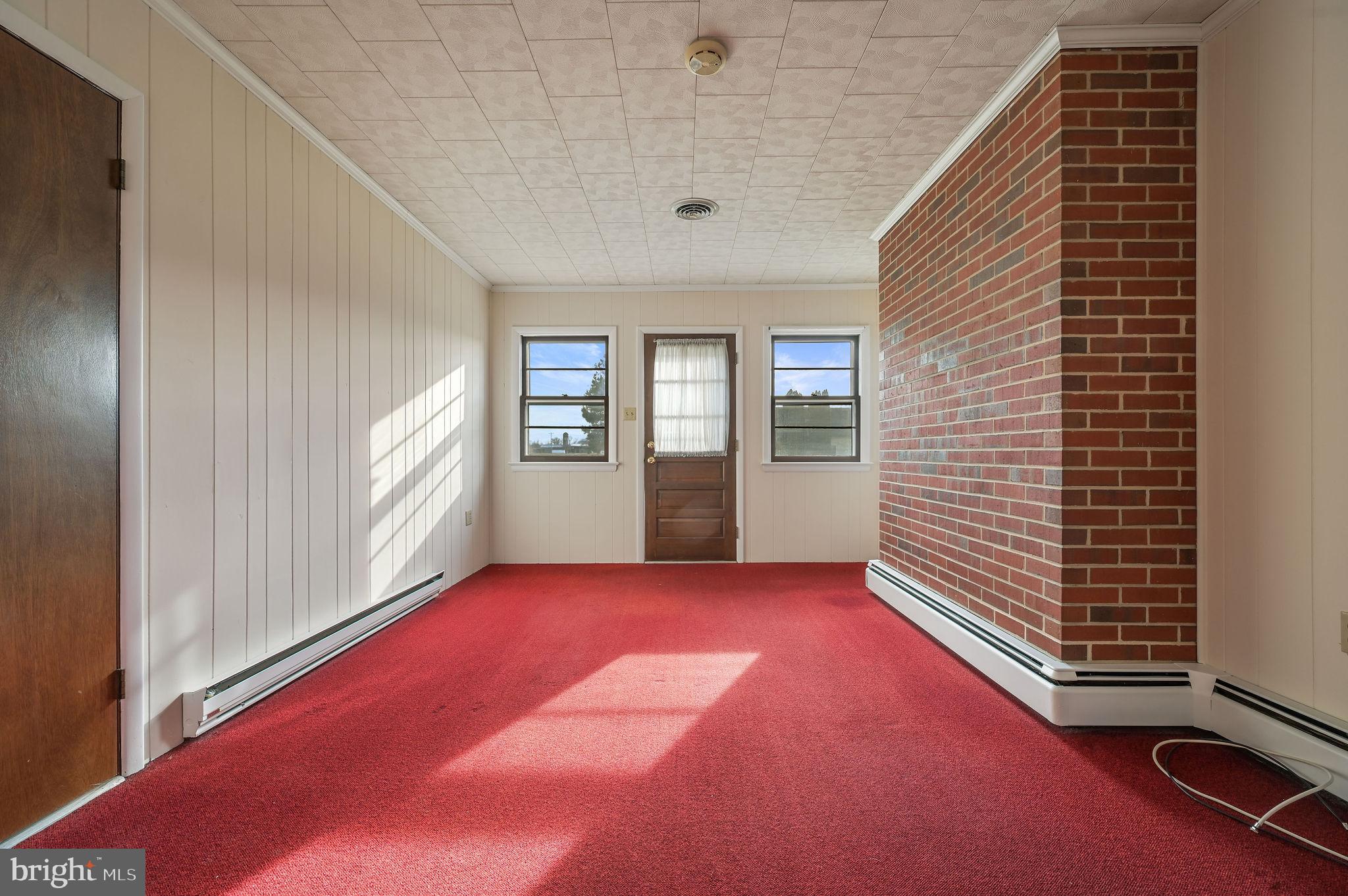 955 Twin Willows Road Smyrna, DE 19977 - Photo 6 of 27 a view of an empty room with a window