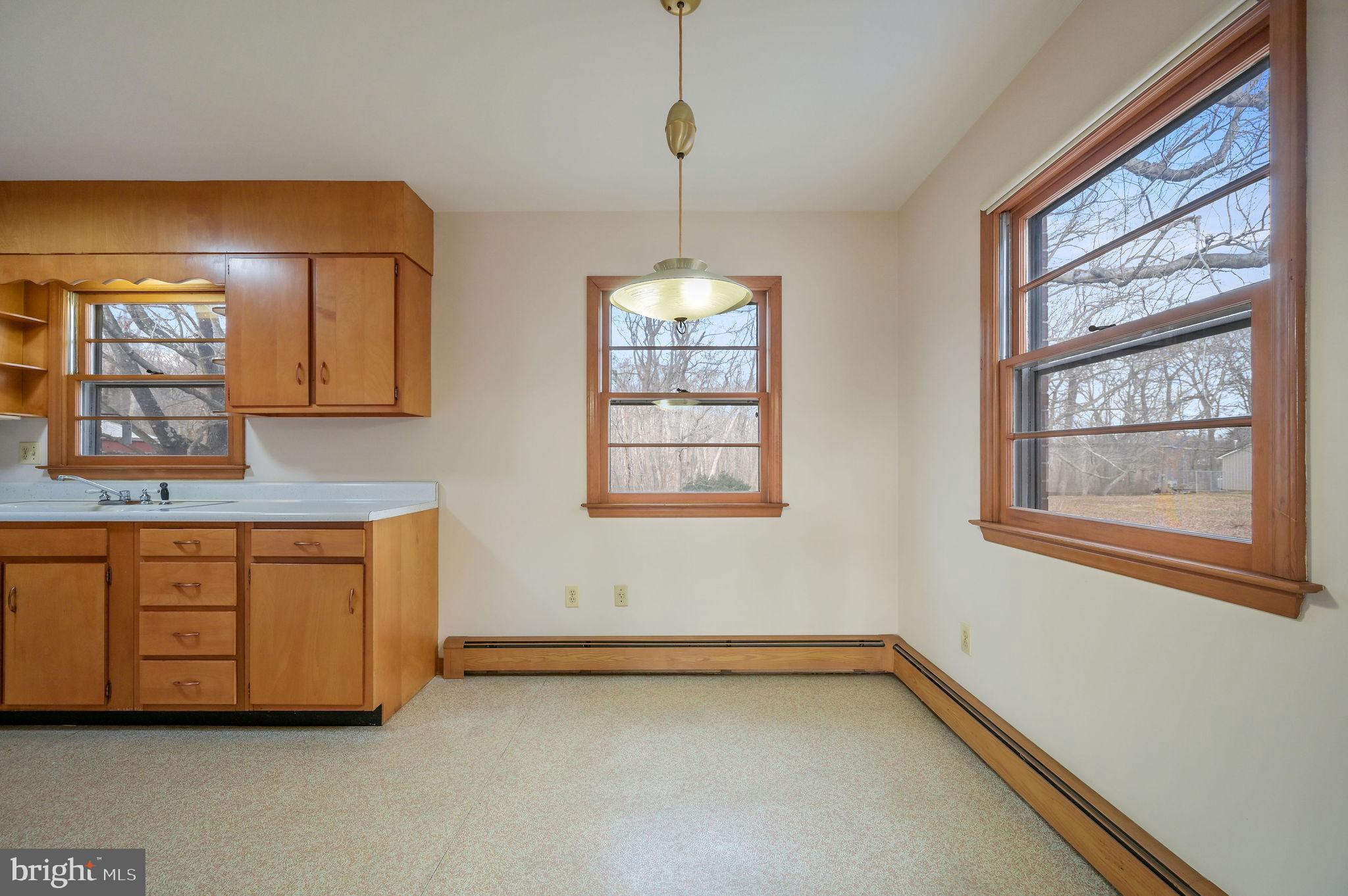 955 Twin Willows Road Smyrna, DE 19977 - Photo 7 of 27 a bathroom with a tub sink and mirror