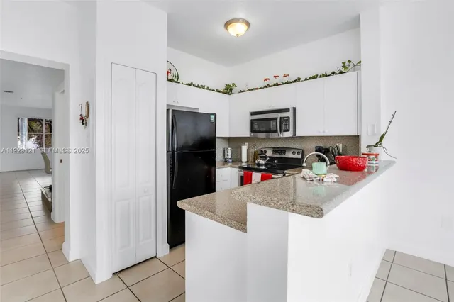 $345,000 | 17710 Northwest 73rd Avenue, Unit 20120, Hialeah, FL 33015