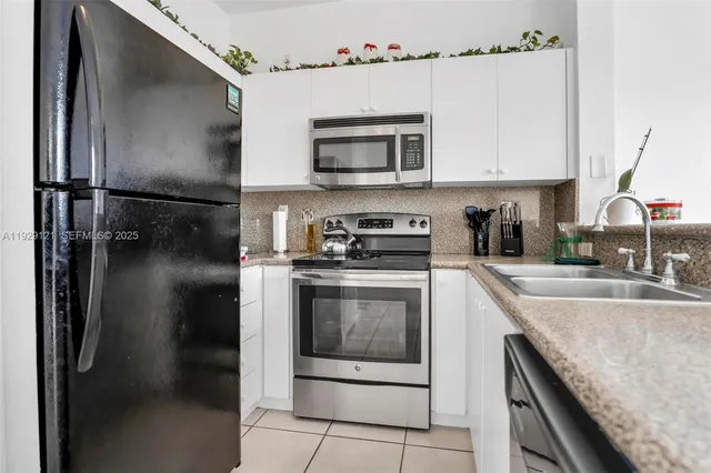 $345,000 | 17710 Northwest 73rd Avenue, Unit 20120, Hialeah, FL 33015