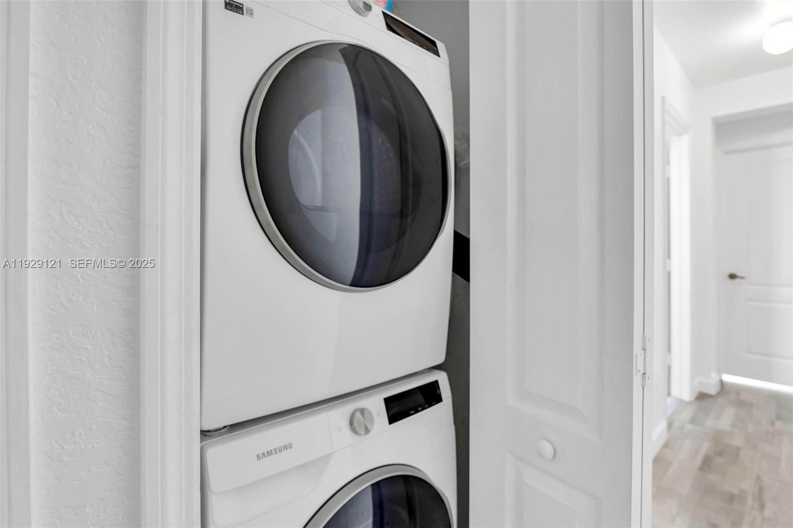 17710 Northwest 73rd Avenue, Unit 20120 Hialeah, FL 33015 - Photo 28 of 39 a view of livingroom with washer and dryer