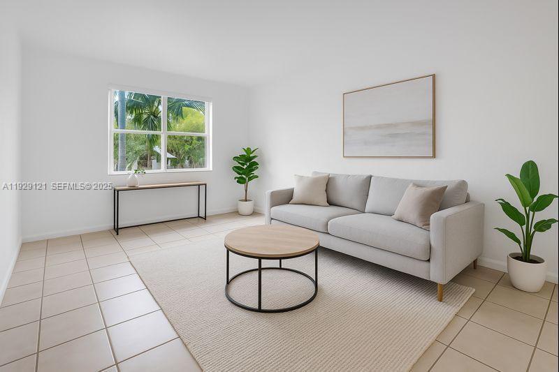 17710 Northwest 73rd Avenue, Unit 20120 Hialeah, FL 33015 - Photo 3 of 39 a living room with furniture and a window