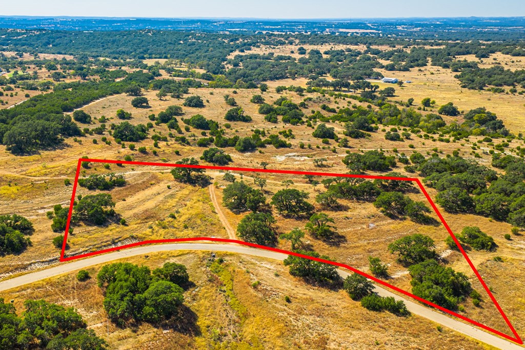 1495 Walnut Springs Road, Unit 68 Johnson City, TX 78636 - Photo 3 of 23 an aerial view of residential houses with outdoor space