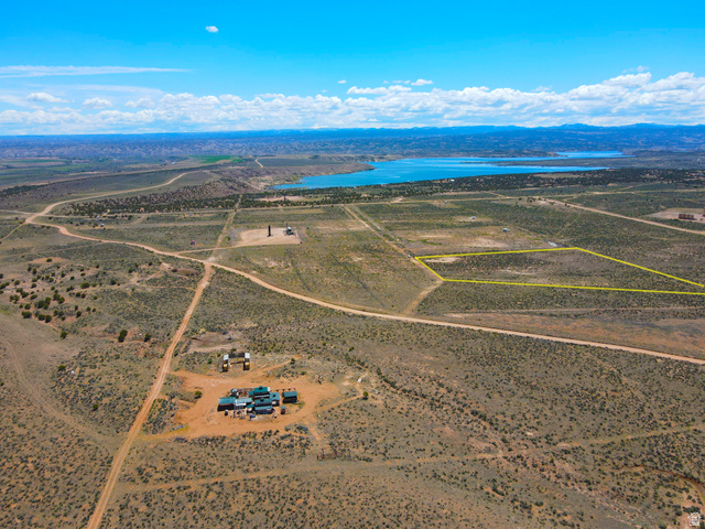 4500 South 22750th Duchesne, UT 84021 - Photo 24 of 34 Expansive arid terrain featuring a body of water in the background and a distant mountain range