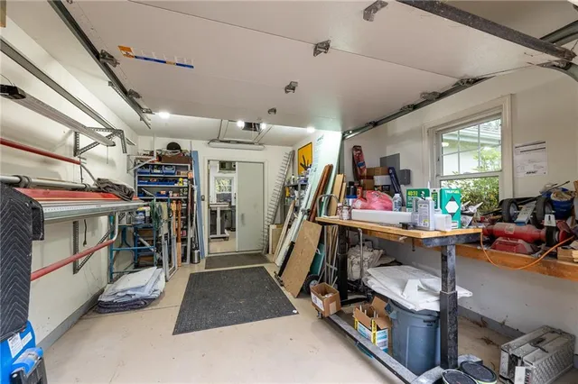 a kitchen that has a lot of cabinets in it