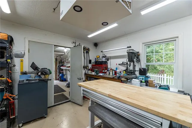 a room with furniture and a fireplace