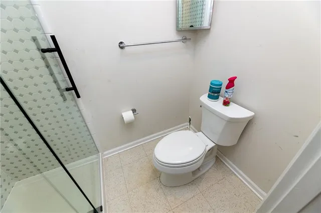 a view of a house with a yard and tree s