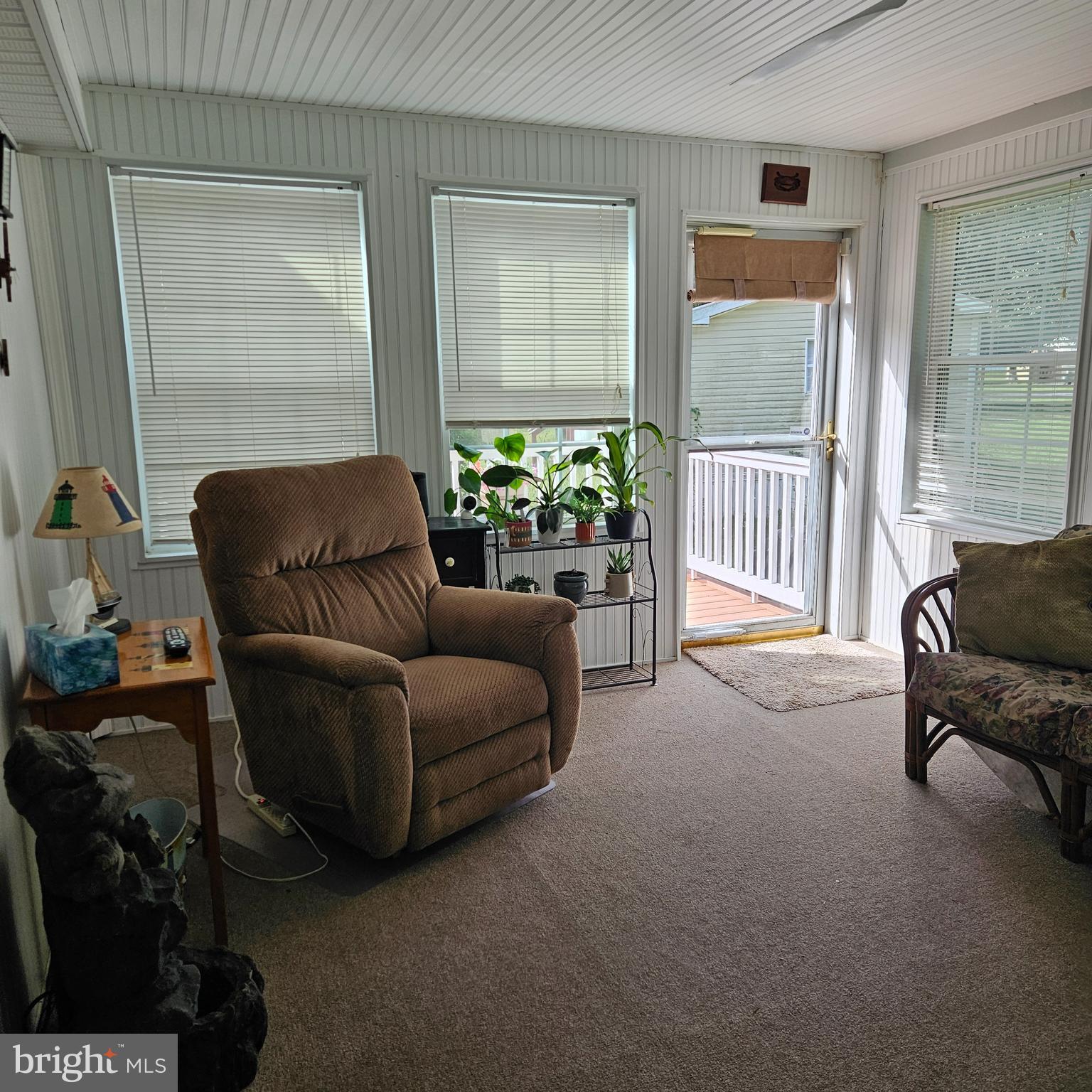 24212 Durham Street Georgetown, DE 19947 - Photo 12 of 21 a living room with furniture and a window