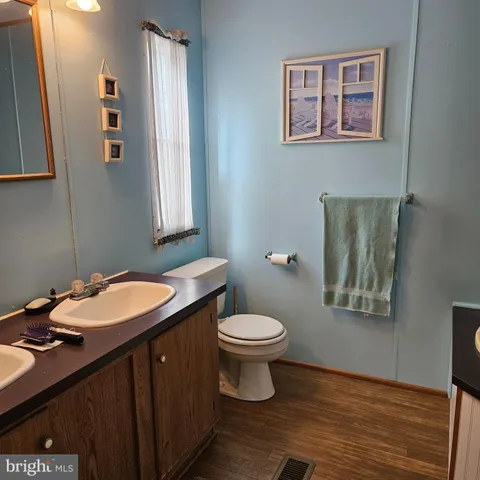 a bathroom with a sink and a toilet