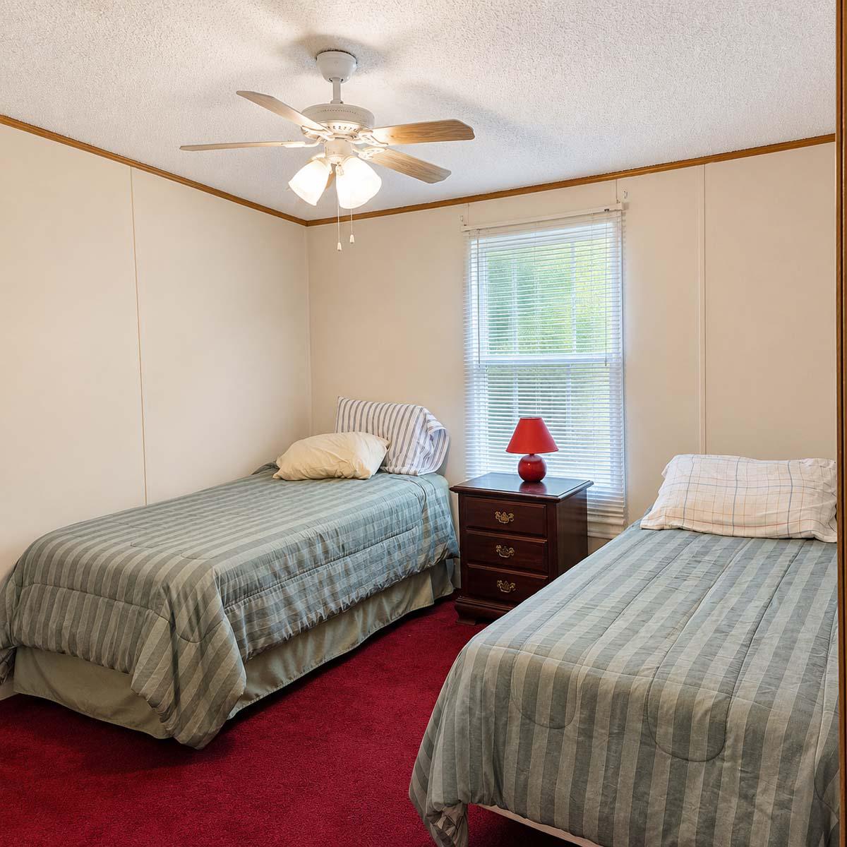 24212 Durham Street Georgetown, DE 19947 - Photo 18 of 21 Comfortable twin bed room with natural light