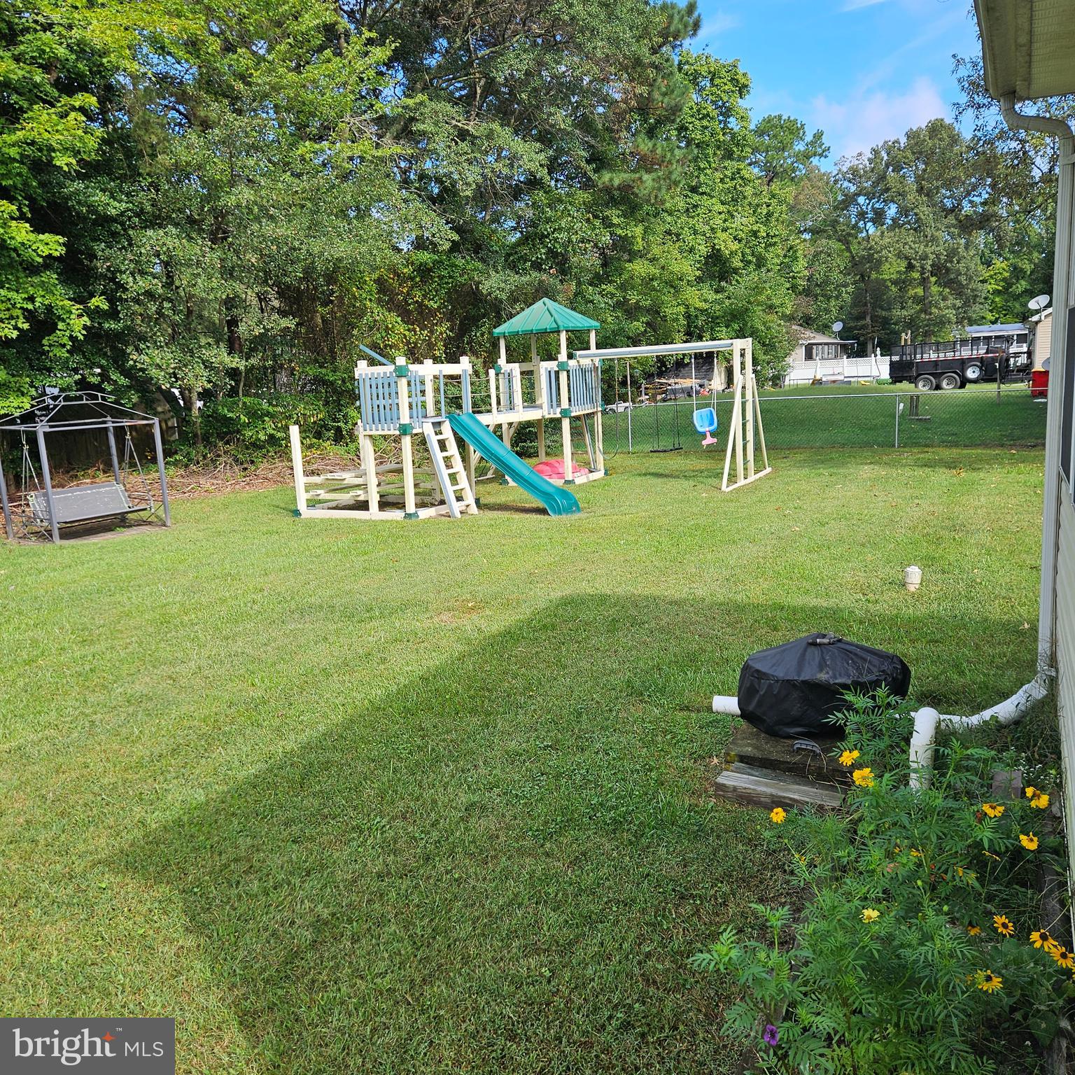 24212 Durham Street Georgetown, DE 19947 - Photo 20 of 21 a front view of a house with a yard