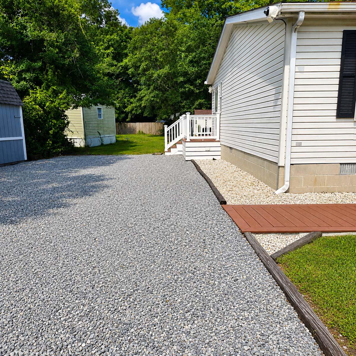 24212 Durham Street Georgetown, DE 19947 - Photo 3 of 21 Gravel driveway and serene yard