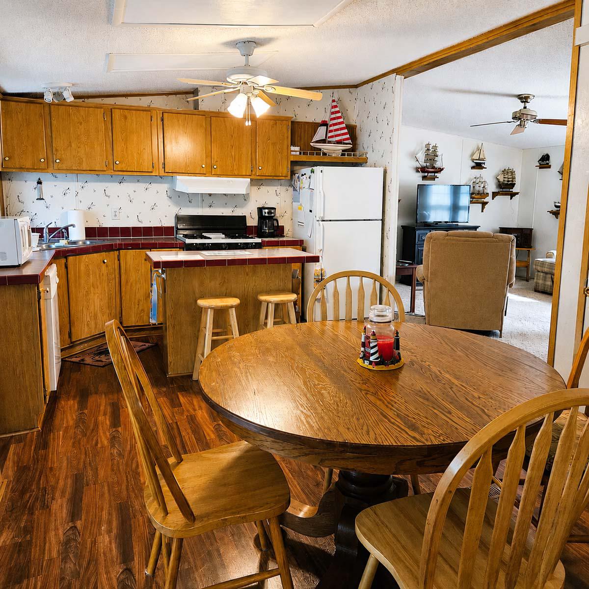24212 Durham Street Georgetown, DE 19947 - Photo 8 of 21 Designated dining area and broad view of kitchen