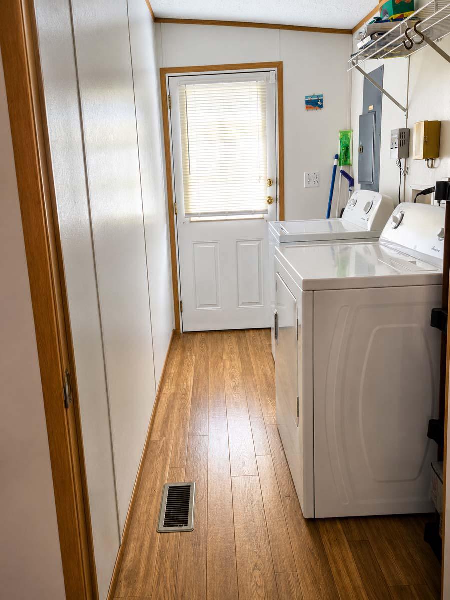 24212 Durham Street Georgetown, DE 19947 - Photo 10 of 21 Bright and functional laundry space