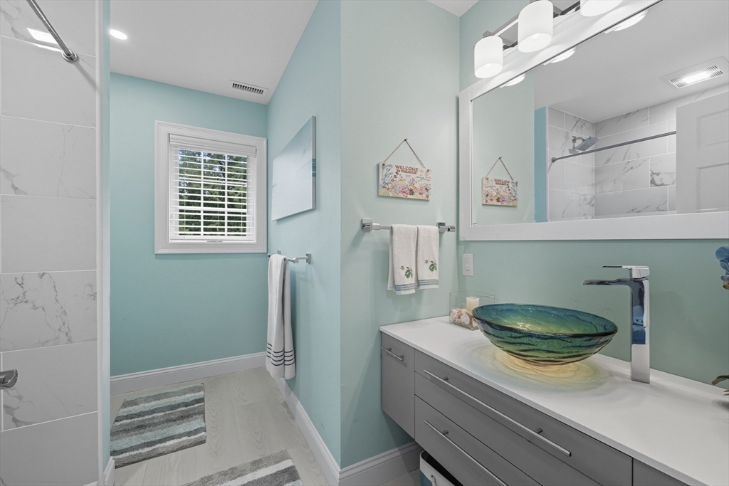 40 East Street Topsfield, MA 01983 - Photo 21 of 39 a kitchen with a sink and cabinets