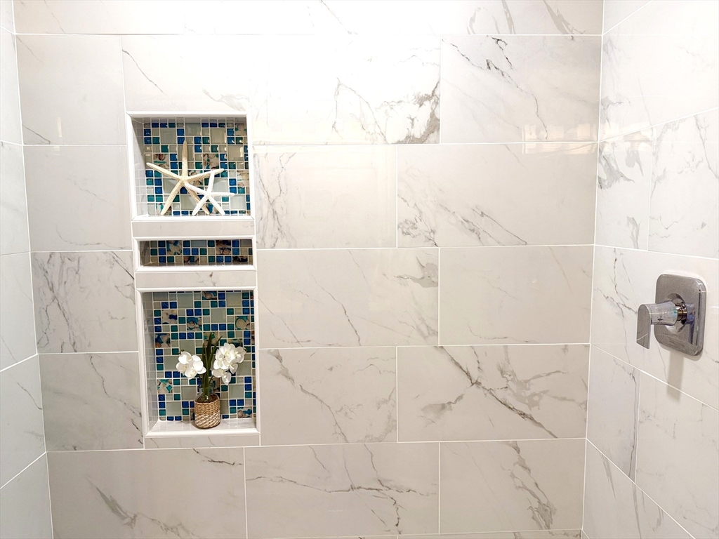 40 East Street Topsfield, MA 01983 - Photo 22 of 39 a bathroom with a window and a shower