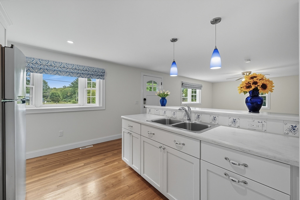 40 East Street Topsfield, MA 01983 - Photo 23 of 39 a bathroom with a sink and a window