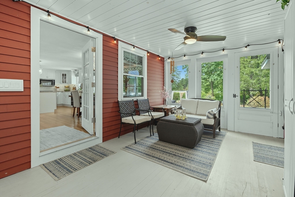 40 East Street Topsfield, MA 01983 - Photo 3 of 39 a living room with furniture and a floor to ceiling window