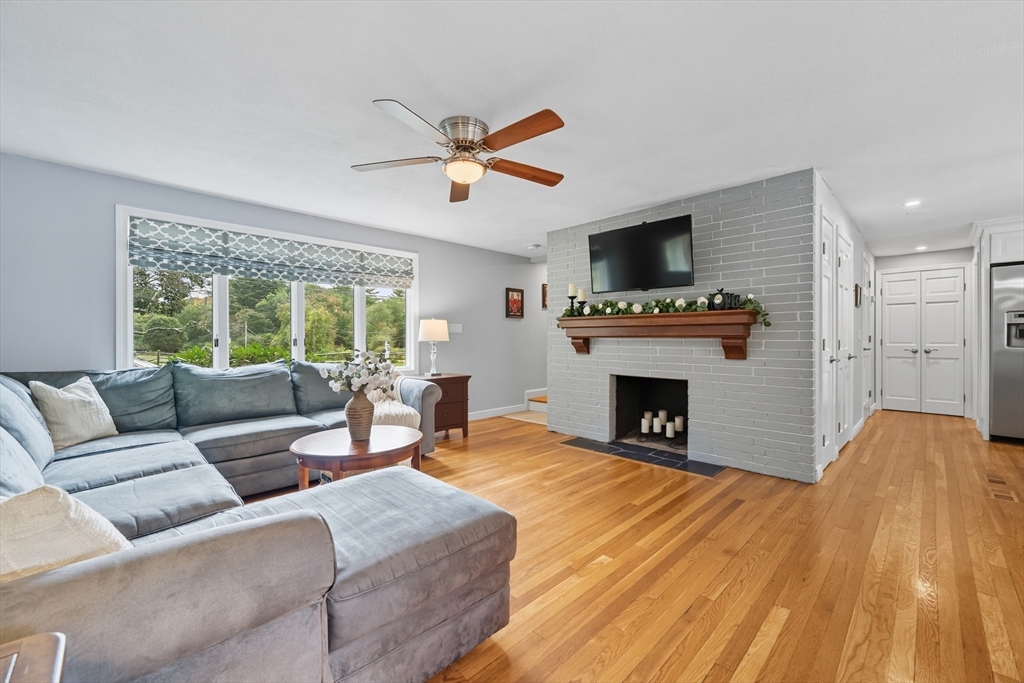 40 East Street Topsfield, MA 01983 - Photo 4 of 39 a living room with furniture and a fireplace