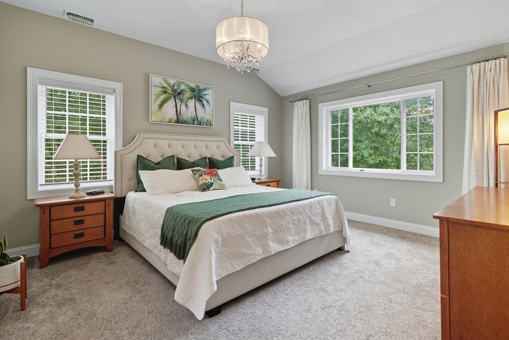 40 East Street Topsfield, MA 01983 - Photo 10 of 39 a bedroom with a bed and a dresser next to a window