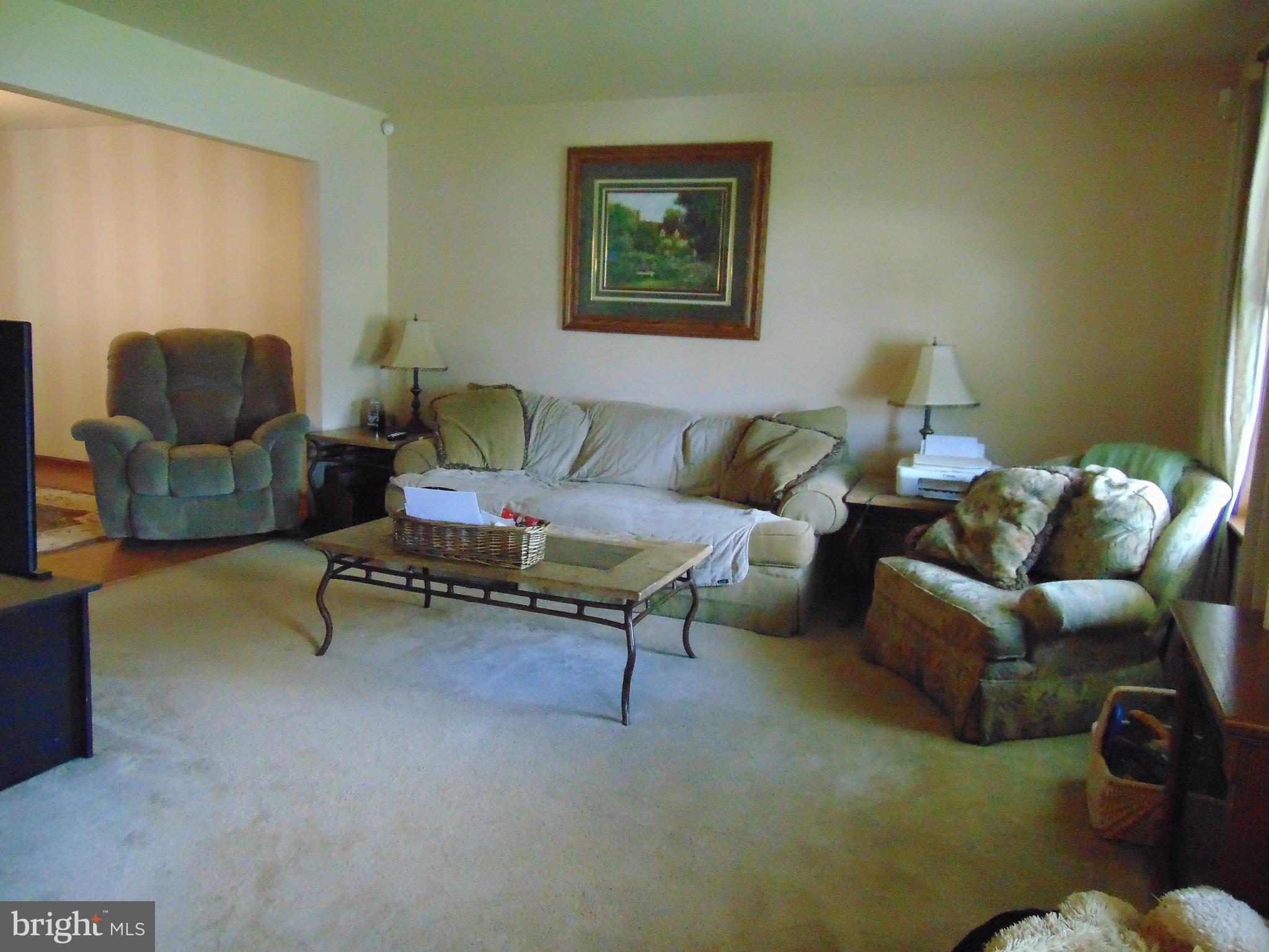 8411 Berkfield Road Baltimore, MD 21237 - Photo 4 of 23 View from front foyer to Living Rm