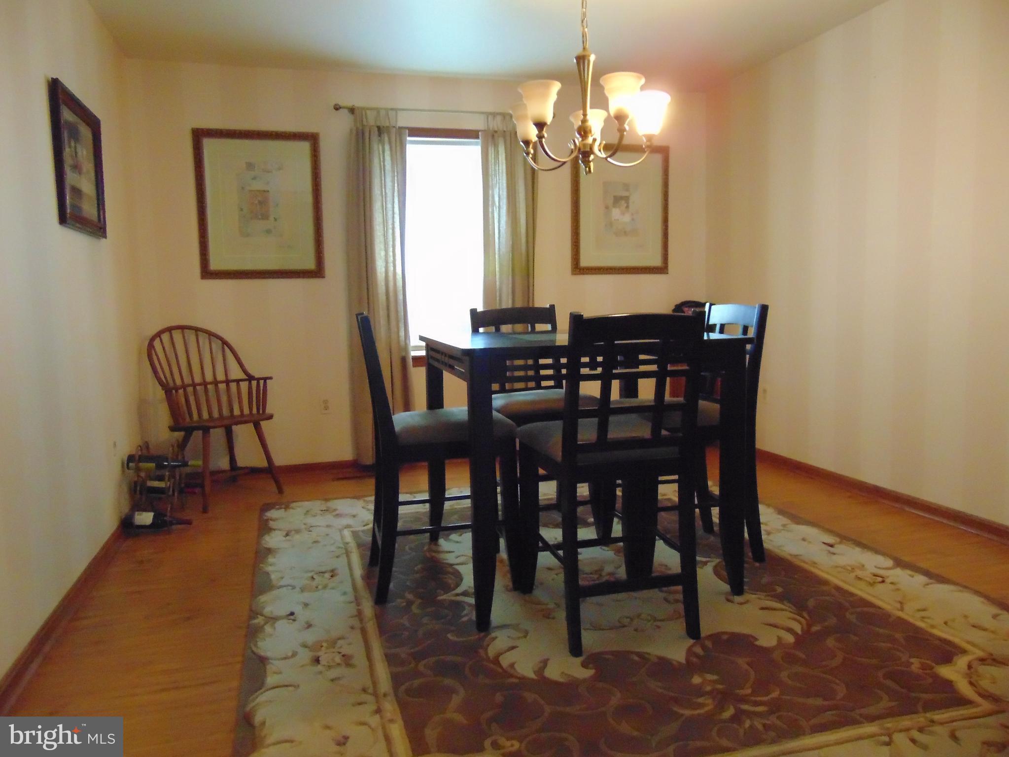 8411 Berkfield Road Baltimore, MD 21237 - Photo 6 of 23 Formal Dining Room great flow to KIT & LR