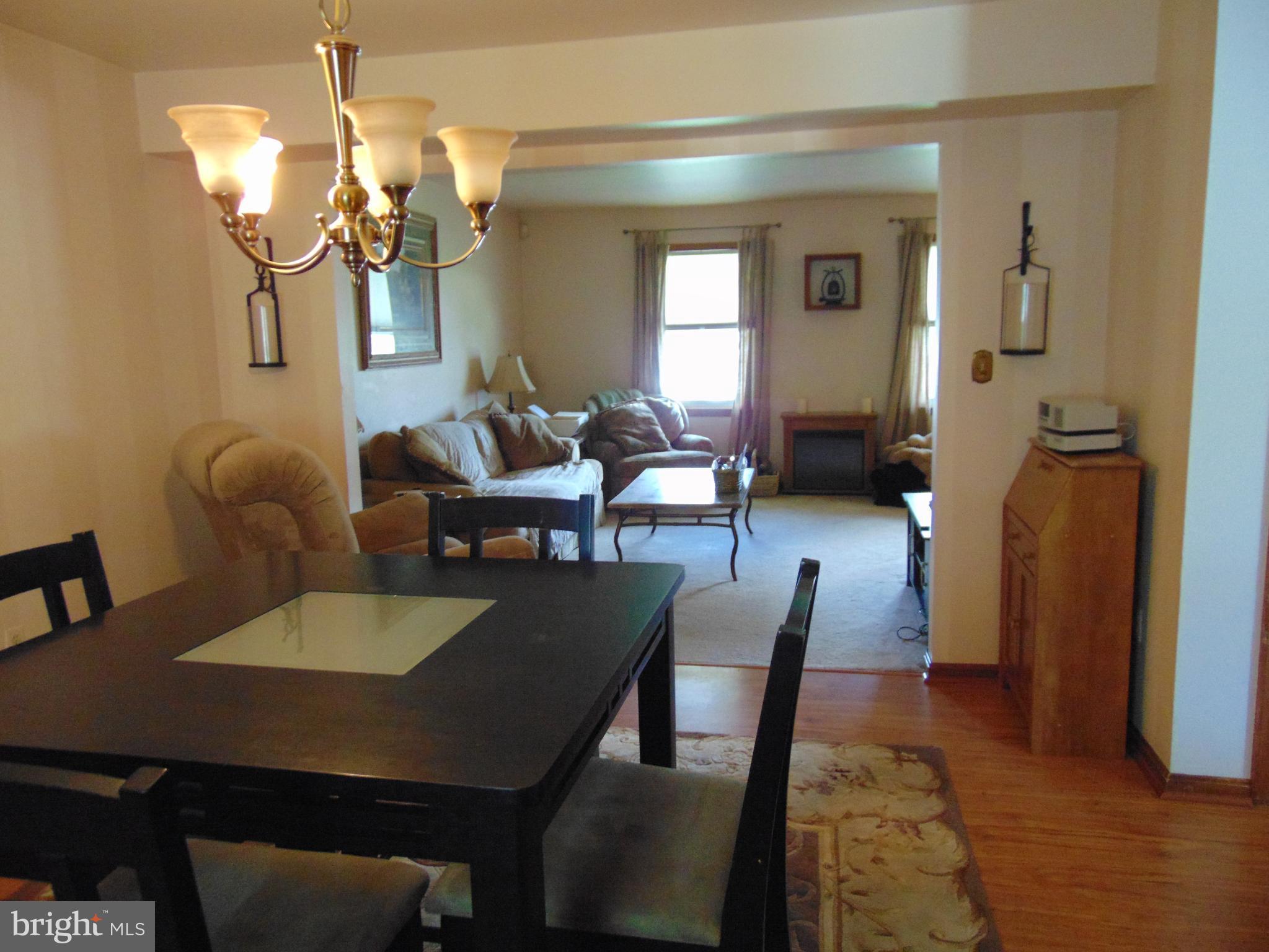 8411 Berkfield Road Baltimore, MD 21237 - Photo 7 of 23 View Dining Rm to Living Rm