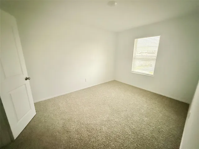 a bathroom with a bath tub