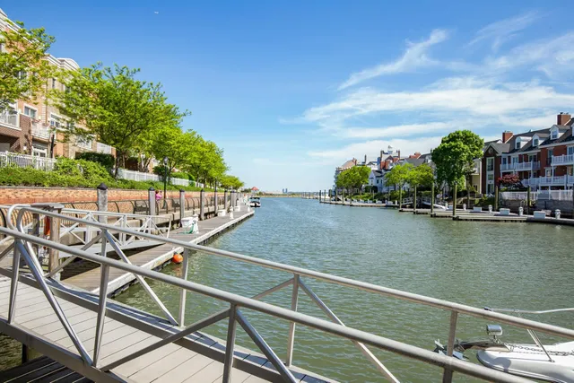a view of a balcony with two chairs and a table