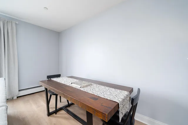 a view of a workspace with furniture