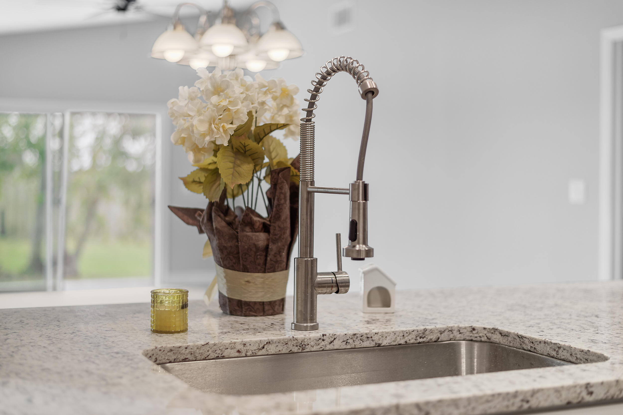 4777 Southeast Salvatori Road Stuart, FL 34997 - Photo 6 of 28 a bathroom with a sink and a mirror