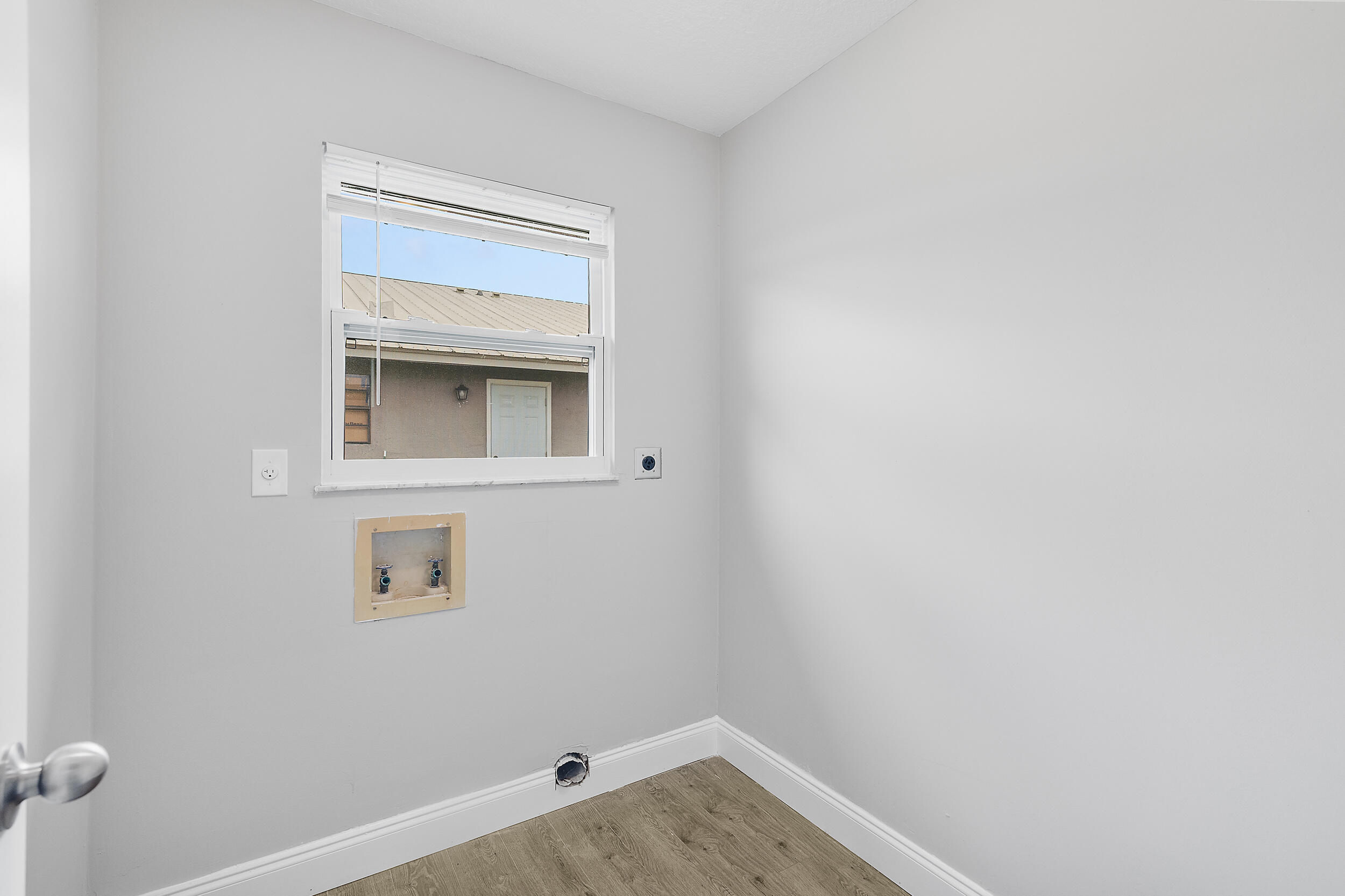 4777 Southeast Salvatori Road Stuart, FL 34997 - Photo 10 of 28 a view of a small space with a window
