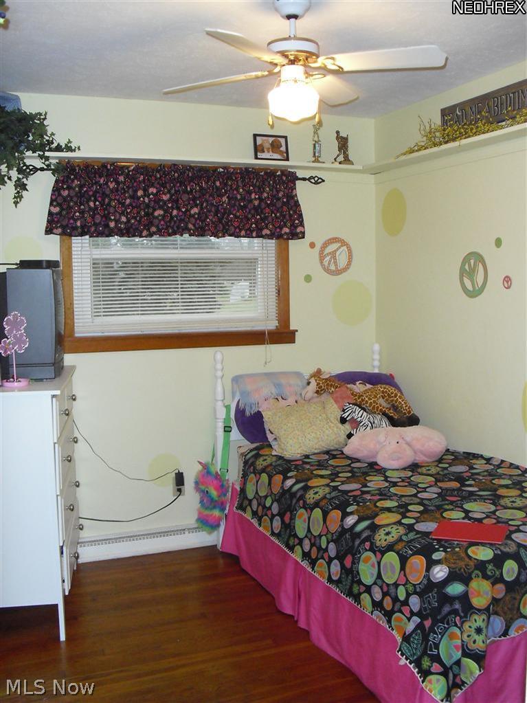 6250 Dodge Road Southwest Canton, OH 44706 - Photo 12 of 25 Charming first floor bedroom with hardwood floors