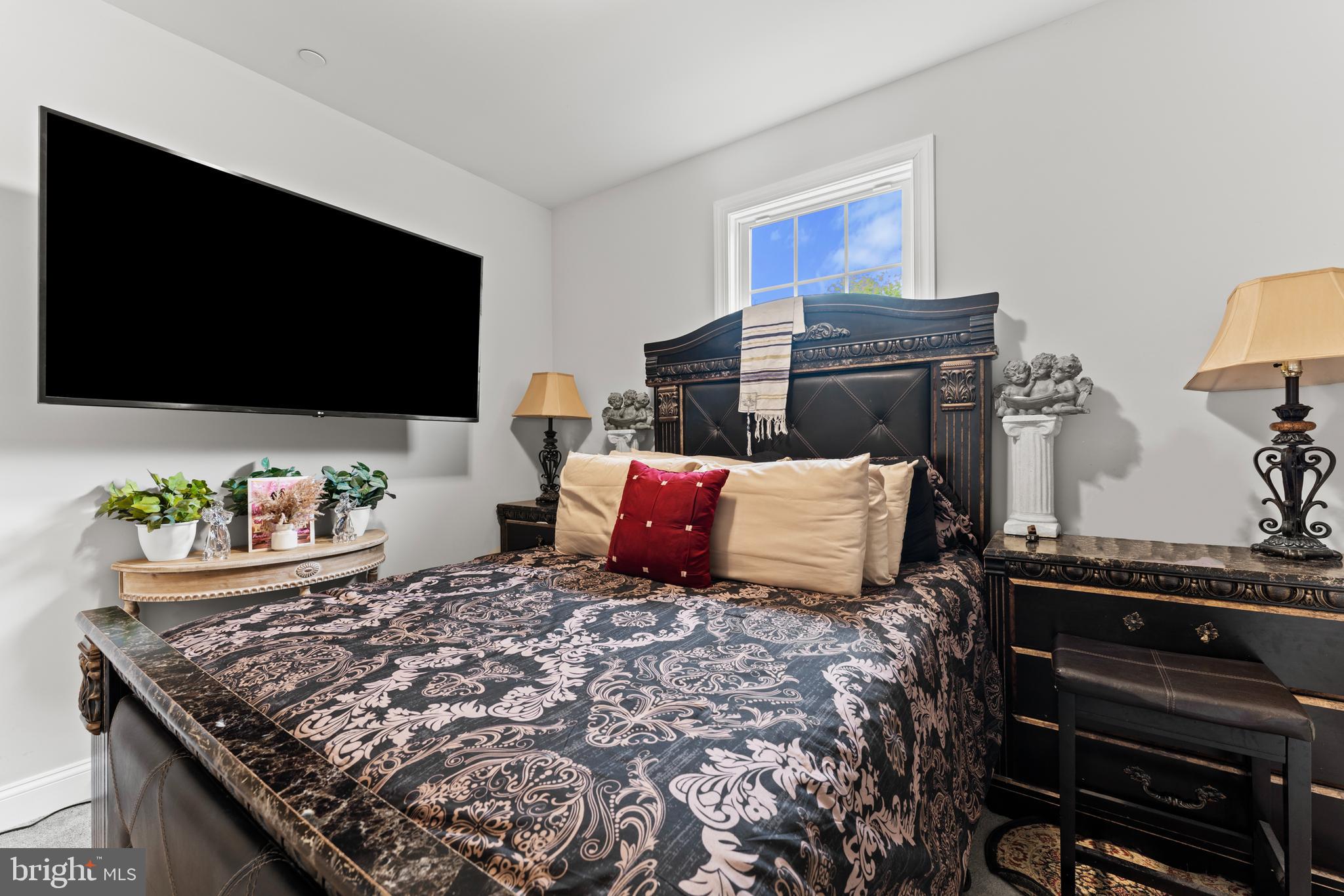 982 Rye Drive La Plata, MD 20646 - Photo 31 of 42 Bright bedroom with wall-mounted TV