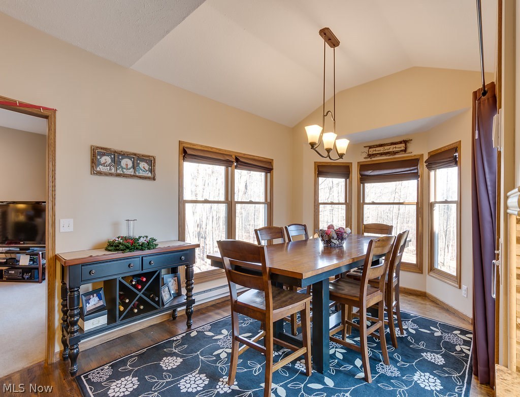 11655 Kile Road Chardon, OH 44024 - Photo 10 of 35 Eat in Kitchen with surrounding windows overlooking wooded backyard