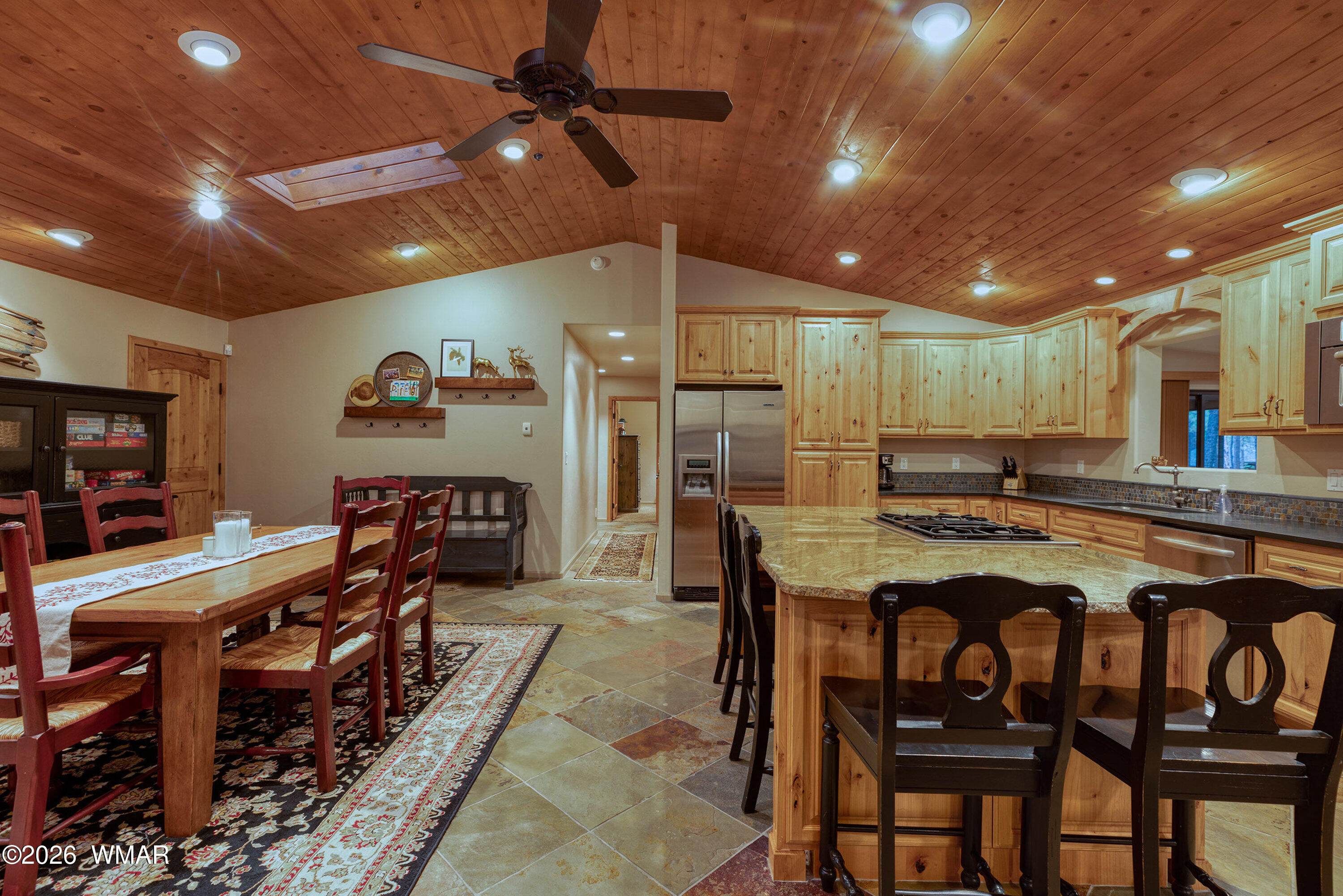 5155 Buck Springs Road Pinetop, AZ 85935 - Photo 9 of 37 a kitchen with a table and chairs in it