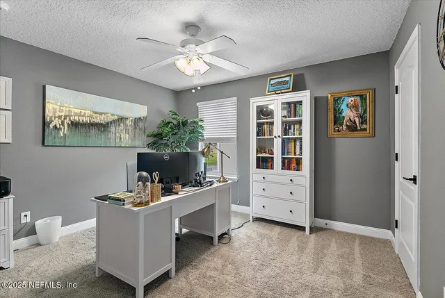 a living room with furniture and decor