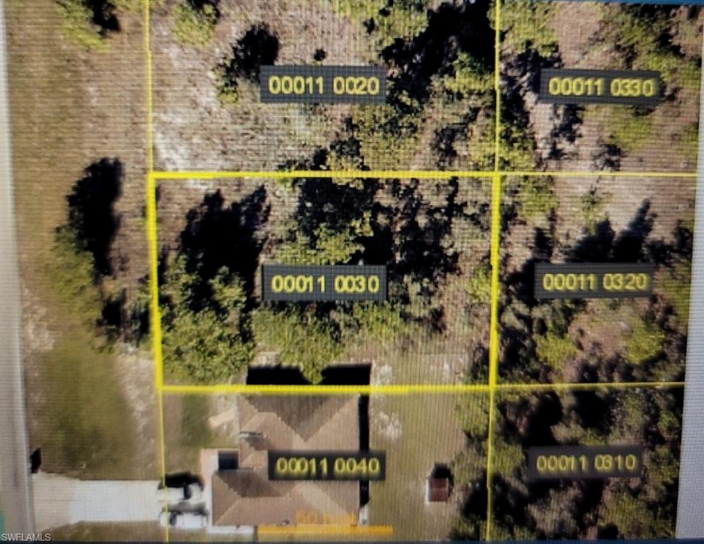 739 Homestead Road South Lehigh Acres, FL 33974 - Photo 1 of 1 a view of a fruit stand