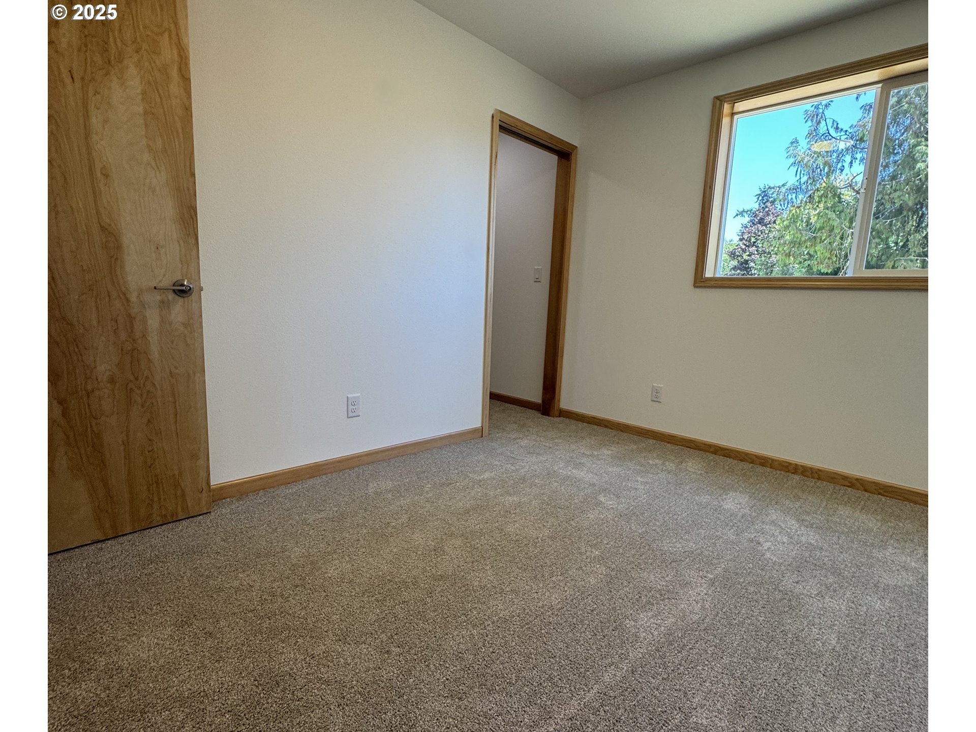 5253 Forest Lane Eugene, OR 97402 - Photo 9 of 25 a view of an empty room with windows