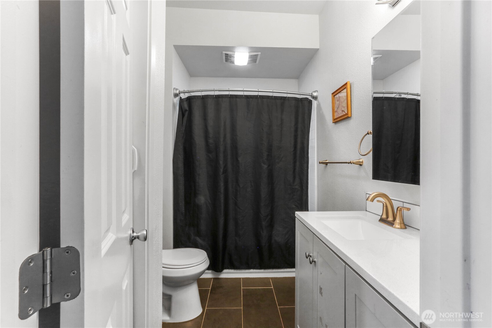 45337 Main Street Concrete, WA 98237 - Photo 15 of 40 a bathroom with a sink toilet and shower