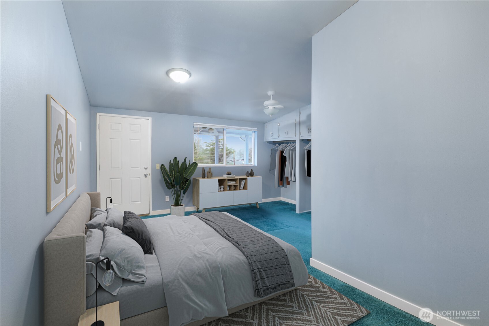 45337 Main Street Concrete, WA 98237 - Photo 32 of 40 a bedroom with a bed and a view of kitchen